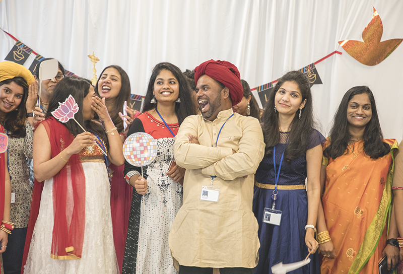 Group of Indian women and men celebrating Diwali