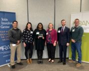 BCBSNE employees accept the IDEAL Award
